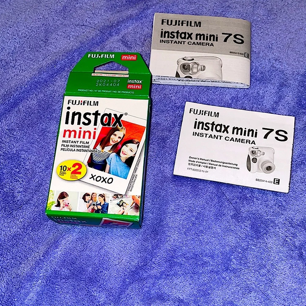 Instaxmini 7S Teal. Comes with film, and directions.